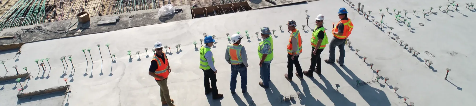Image of people standing on construction site